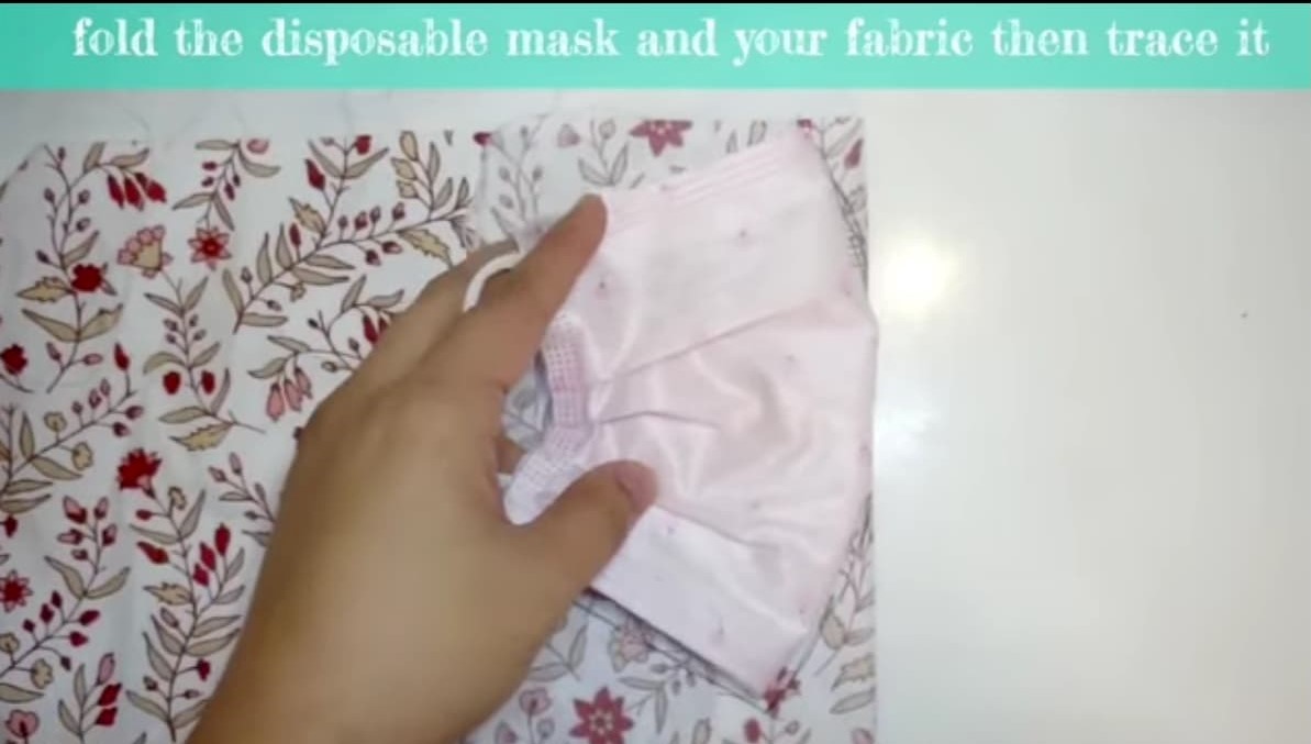 fold dm and place on fabric